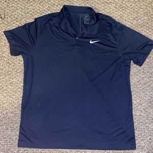 Men’s Nike dri fit baby collared shirt.